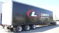 Solid rear wall Curtainside Truck