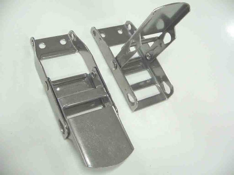 This buckle secures the lower strap. It has a \